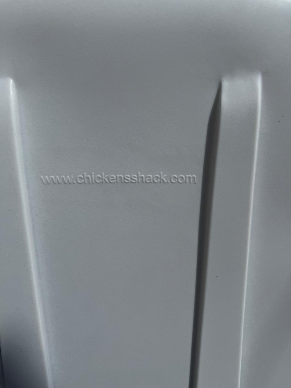 www.chickensshack.com molded into the panel between two vertical ribs