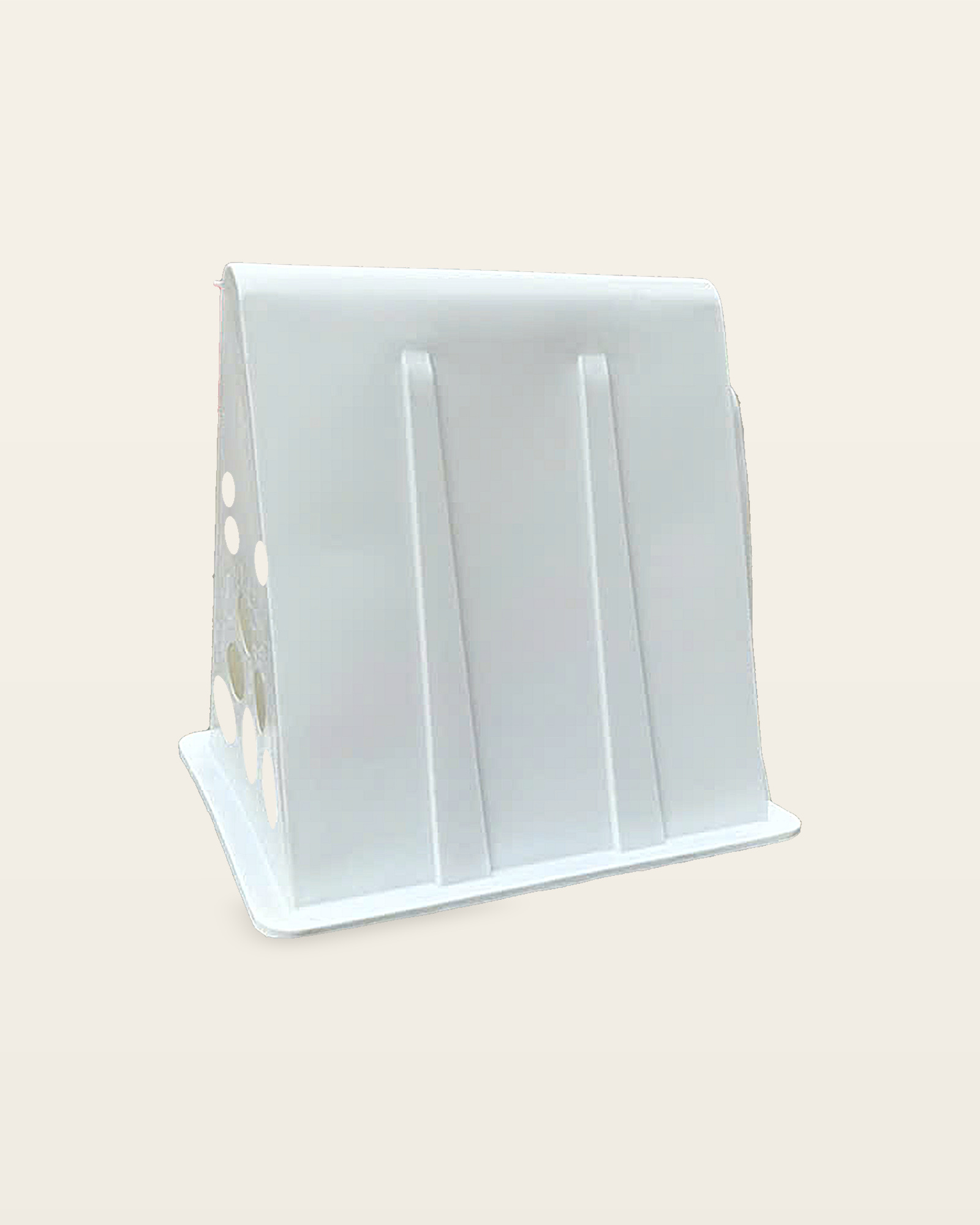 Studio three-quarter of the white A-frame coop