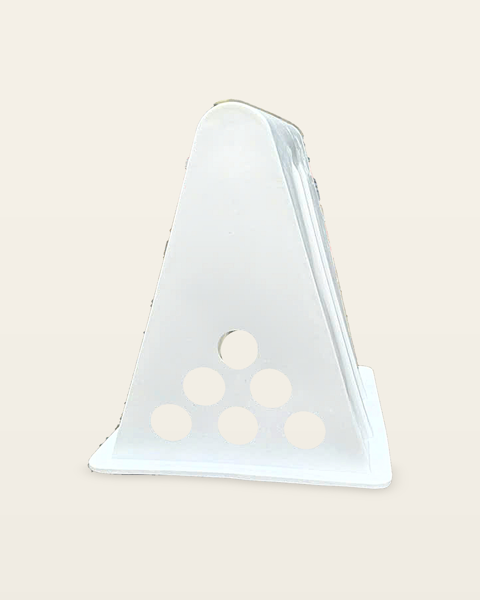 Studio photo of the white A-frame, six-hole vent end